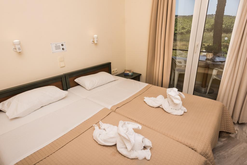 Mythos Beach Hotel Apartments Малеме Экстерьер фото